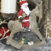 Werner Voß Weihnachtsdeko SANTA AUF SCHAUKELPFERD Höhe 30 cm